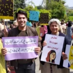 Marchers_holding_placards_during_Aurat_March_2020